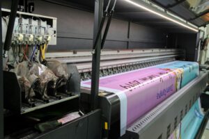 A large format printer doing large printing.