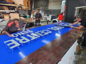 ACM & Chromadek sign-pretoria-redblock