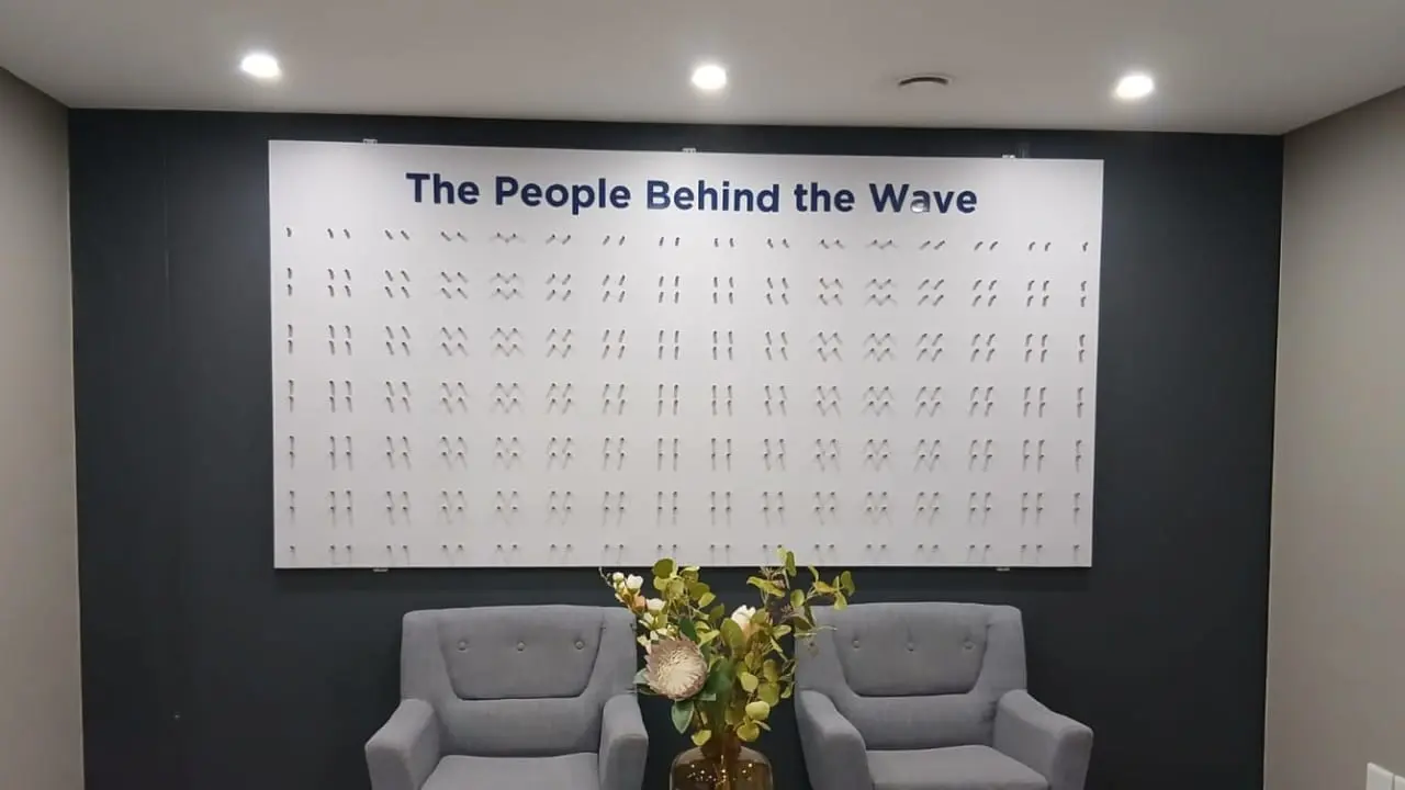 Installed ACM corporate display structure with 360 standoffs arranged in six rows