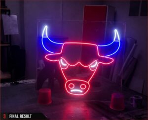 Completed red, blue and white LED neon bull sign illuminated in the Redblock workshop