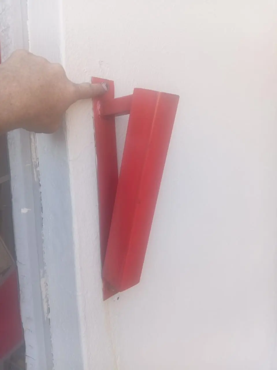 Close-up of the sliding wall bracket used for a projecting banner frame