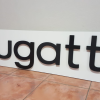 Custom wooden cut-out LED signs with illuminated edges, ideal for unique business branding, storefronts, and home décor